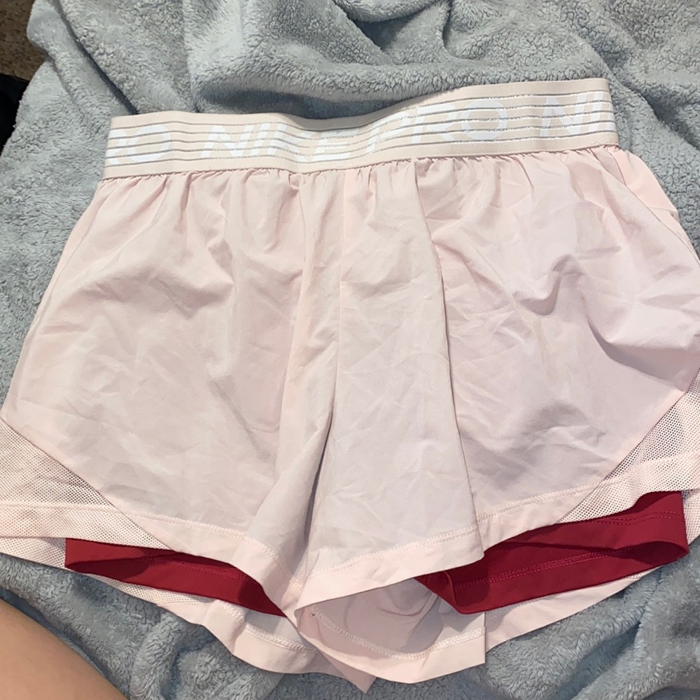 Nike shorts, perfect for a runner, and they have spandex built in.